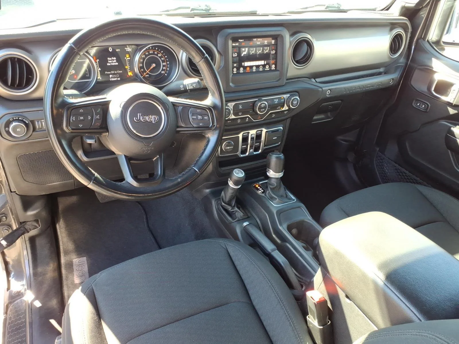 Used 2020 Granite Crystal Metallic Clearcoat Jeep Sport S image 21