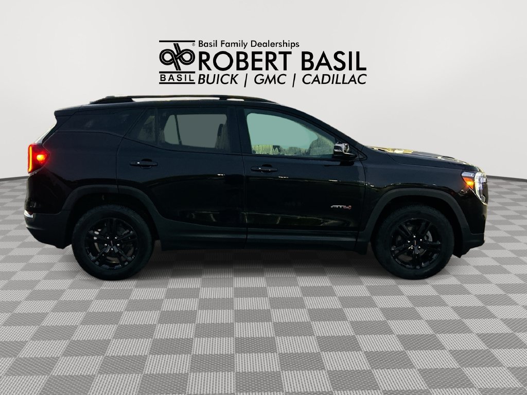 Used 2024 Ebony Twilight Metallic GMC AT4 image 9