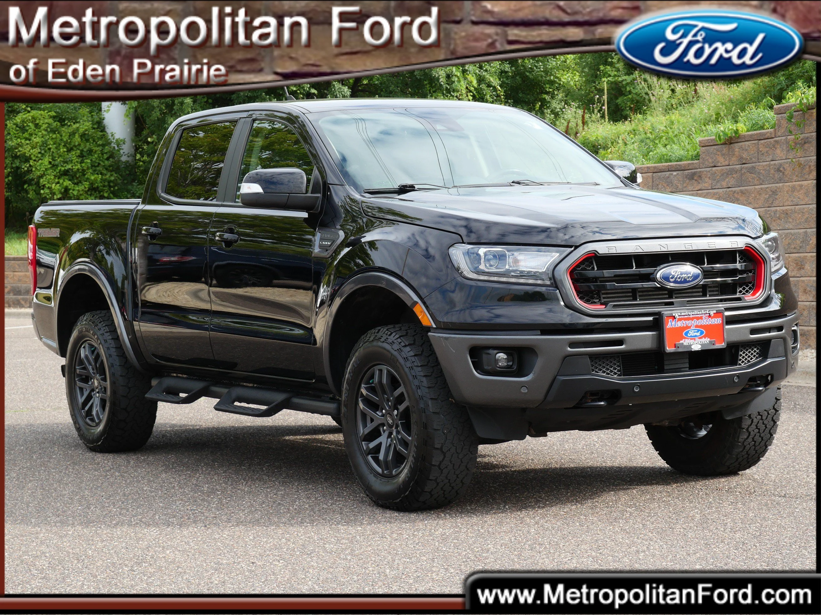 Certified Used 2023 Shadow Black Ford LARIAT 4WD SuperCrew 5 Box image 1