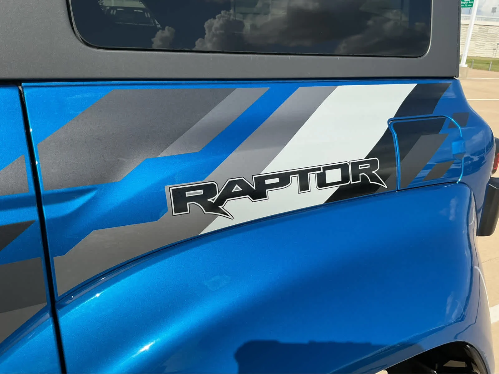 Used 2024 Velocity Blue Metallic Ford Raptor image 10