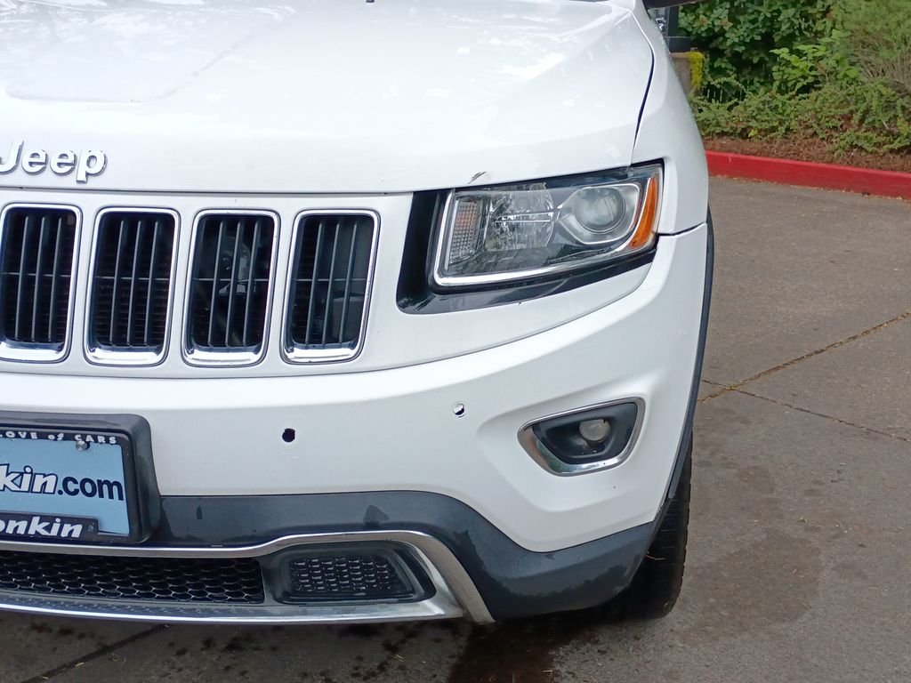 Used 2014 Black Forest Green Pearlcoat Jeep Limited image 9