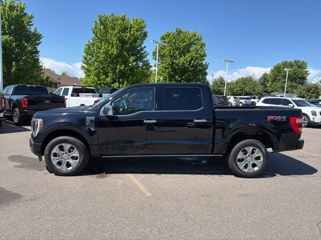 Used 2021 Black Metallic Ford Platinum image 2