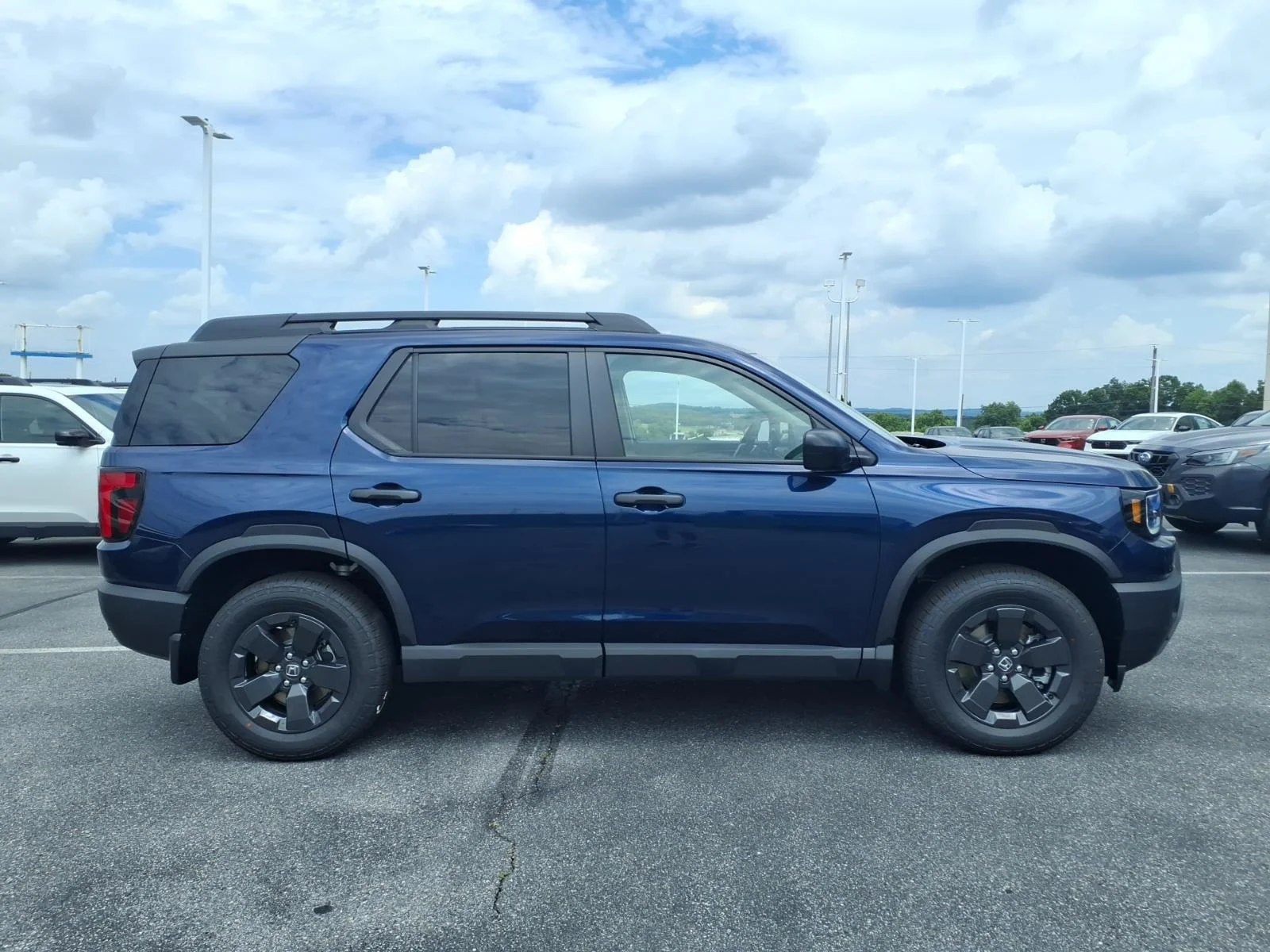 New 2026 Obsidian Blue Pearl Honda RTL image 2