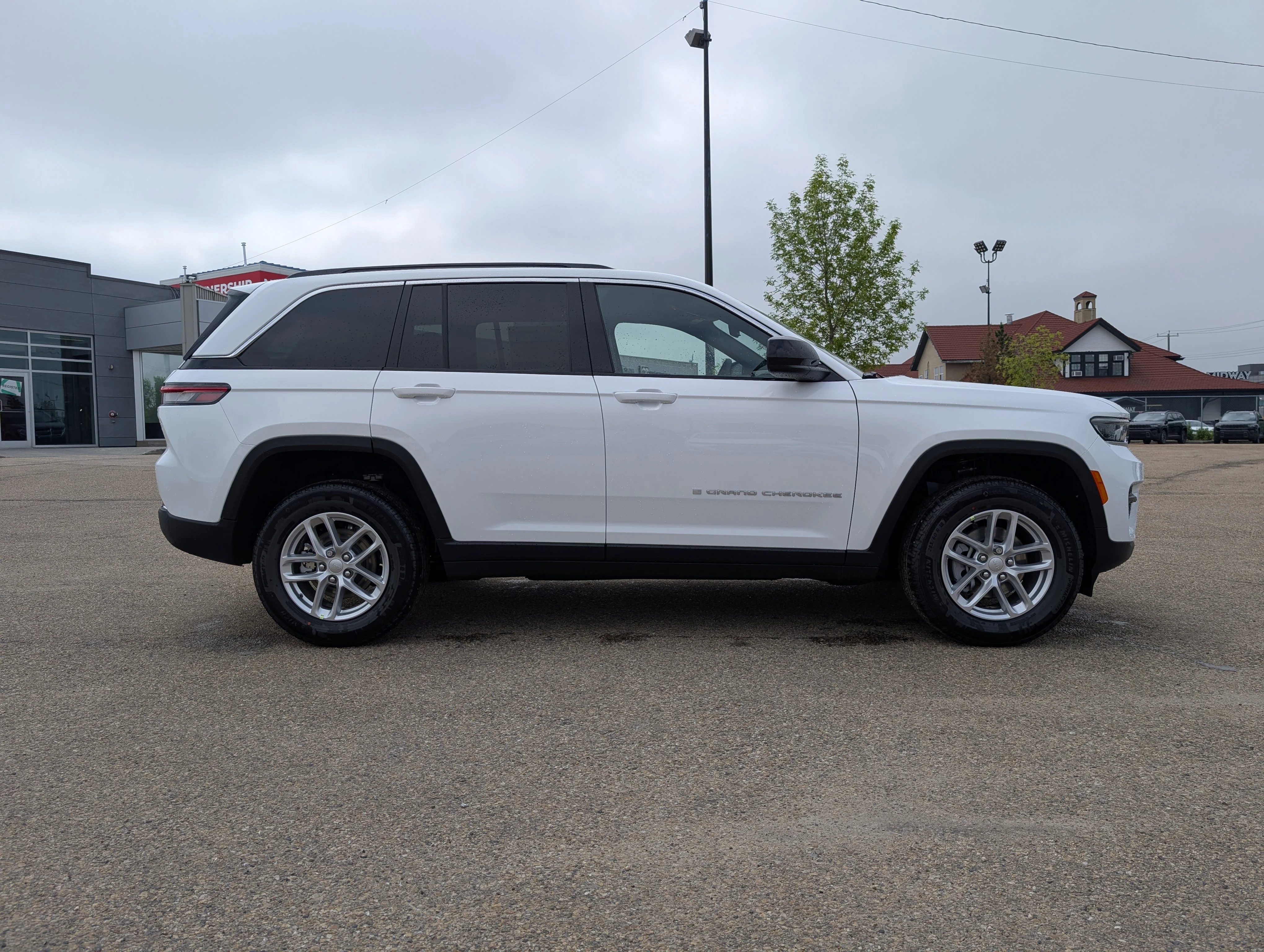 New 2026 Bright White Jeep Laredo image 8