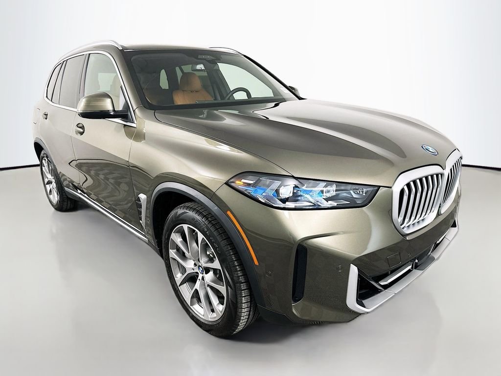 Used 2026 Manhattan Green Metallic BMW xDrive50e image 3