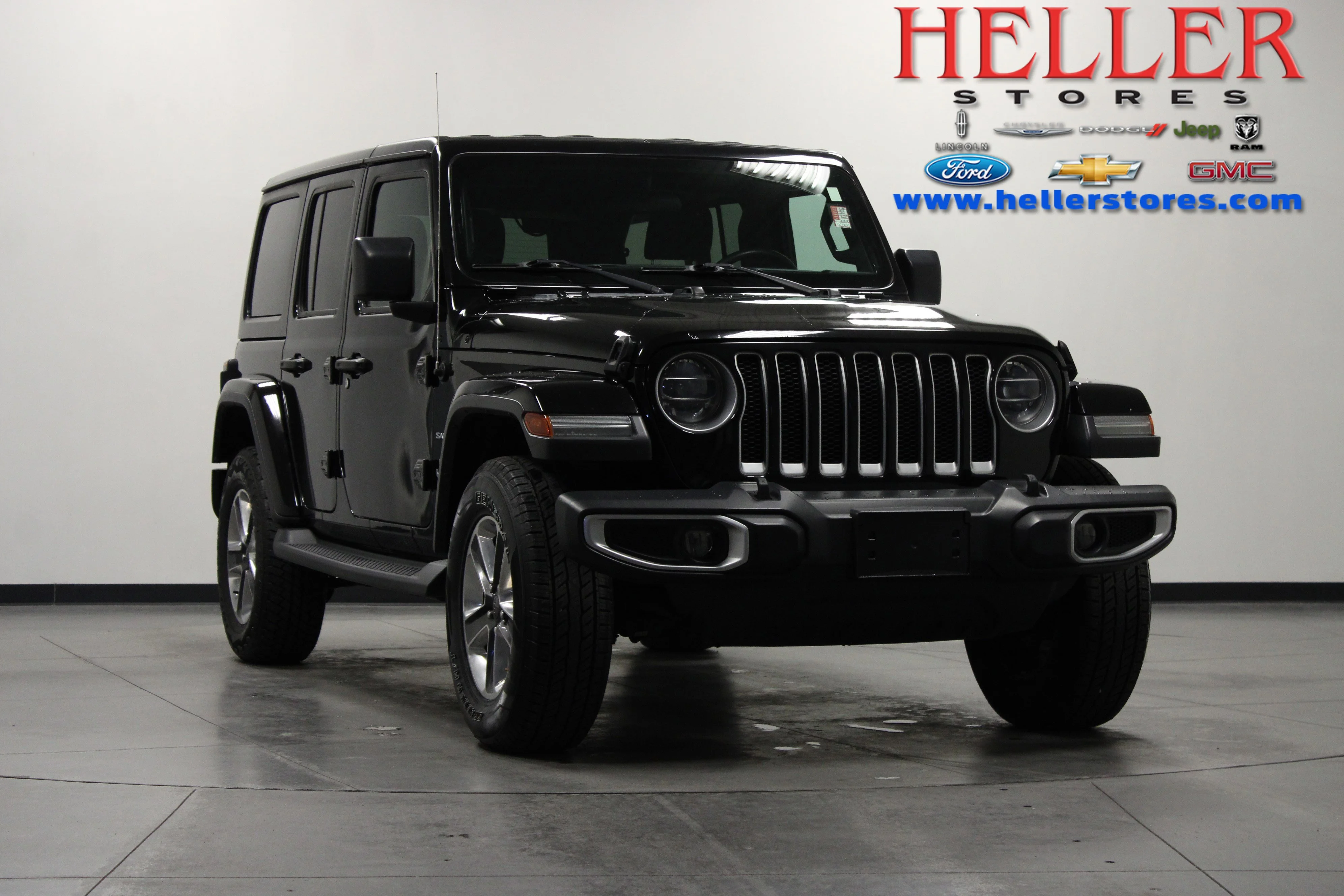Used 2018 Black Clearcoat Jeep Sahara image 1