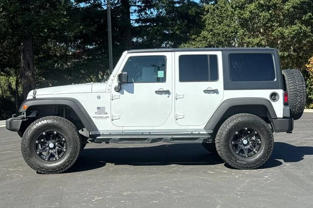 Used 2016 White Jeep Unlimited Sport image 7