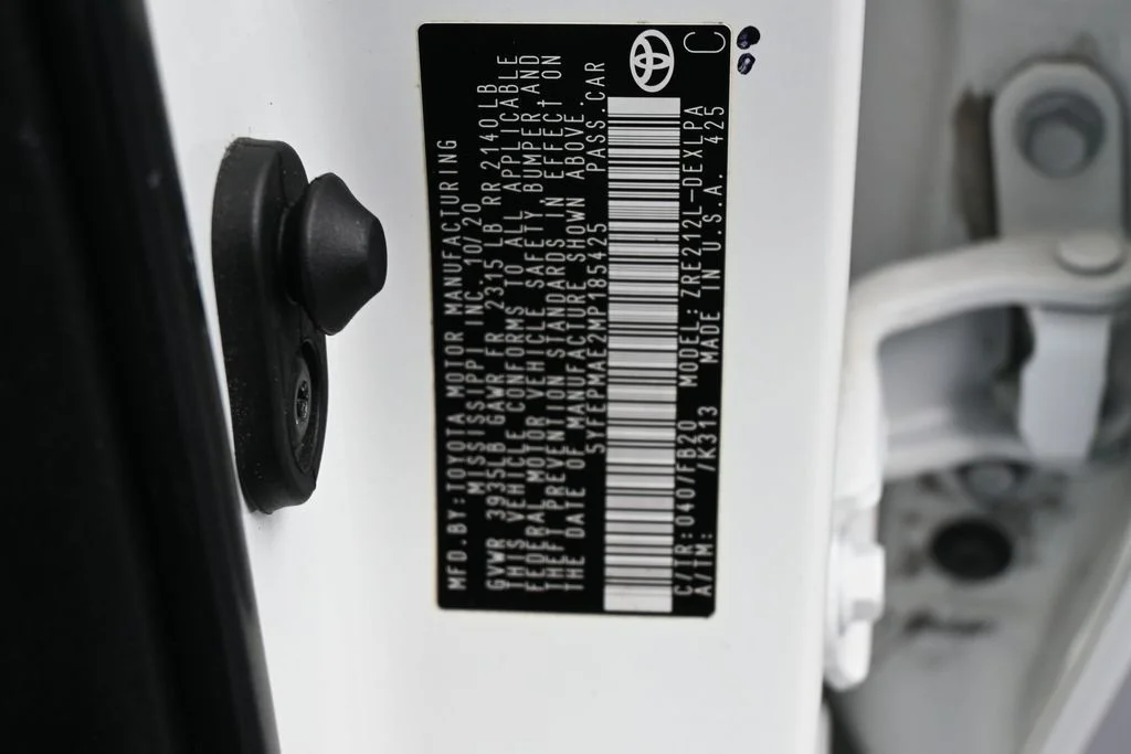 Used 2021 Super White Toyota LE image 14