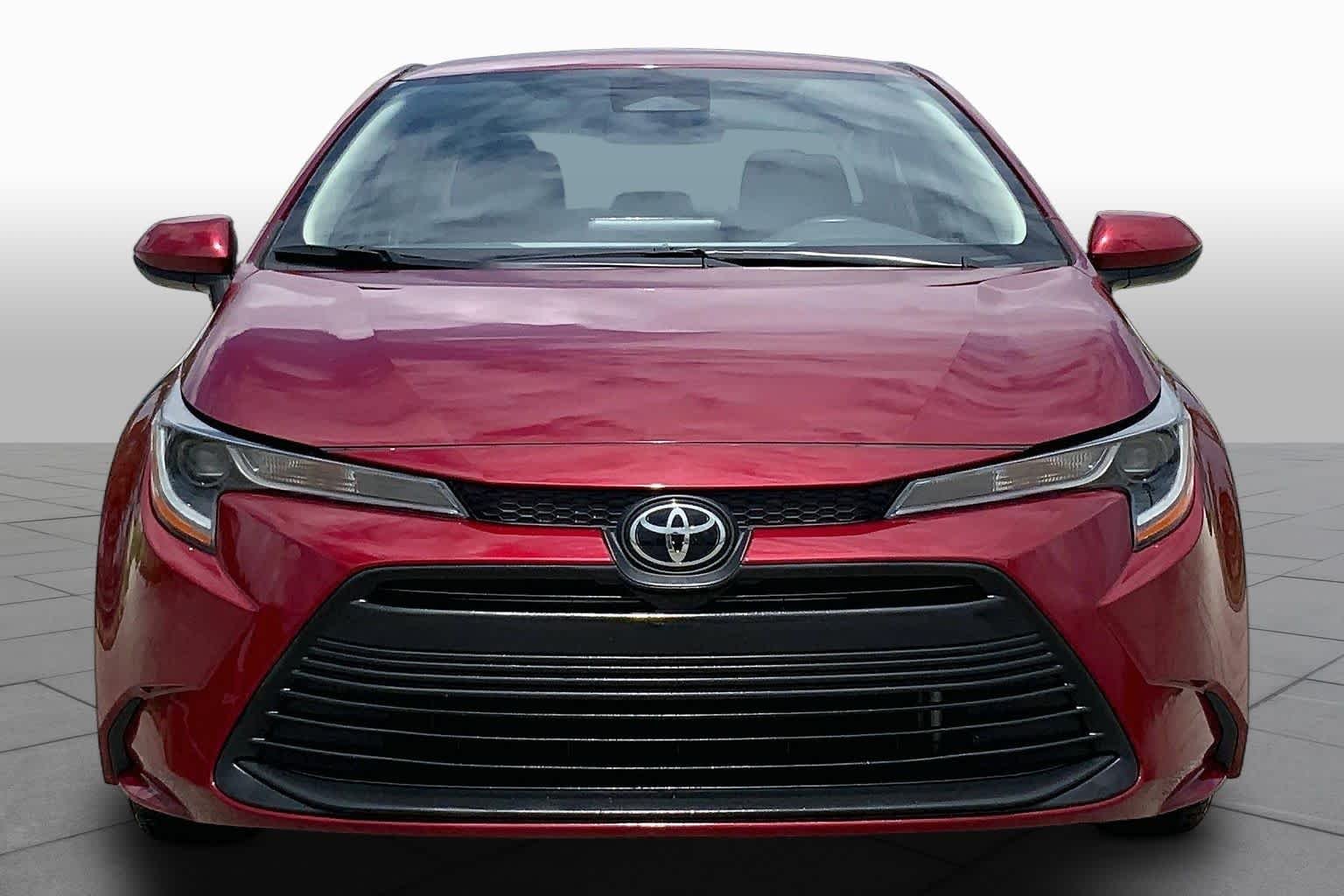 Used 2024 Ruby Flare Pearl Toyota LE image 4