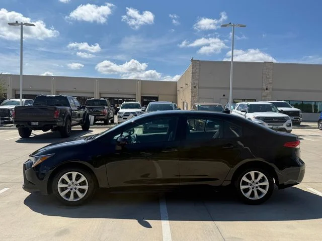 Used 2025 Midnight Black Metallic Toyota LE image 8