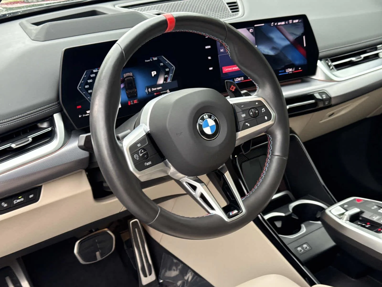 Used 2025 Black Sapphire Metallic BMW M35i image 2