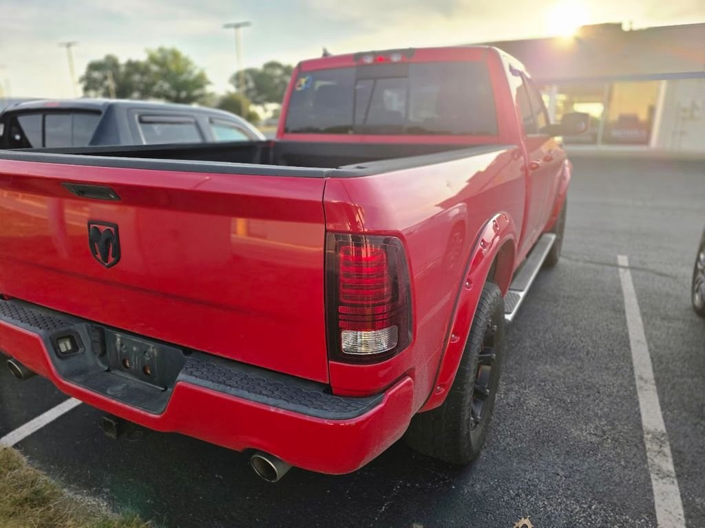 Used 2013 Flame Red Clearcoat Ram Sport image 4