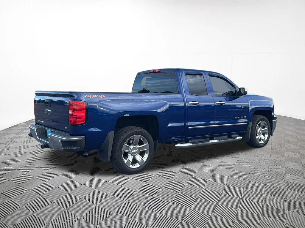Used 2014 BLUE TOPAZ METALLIC Chevrolet LTZ image 9