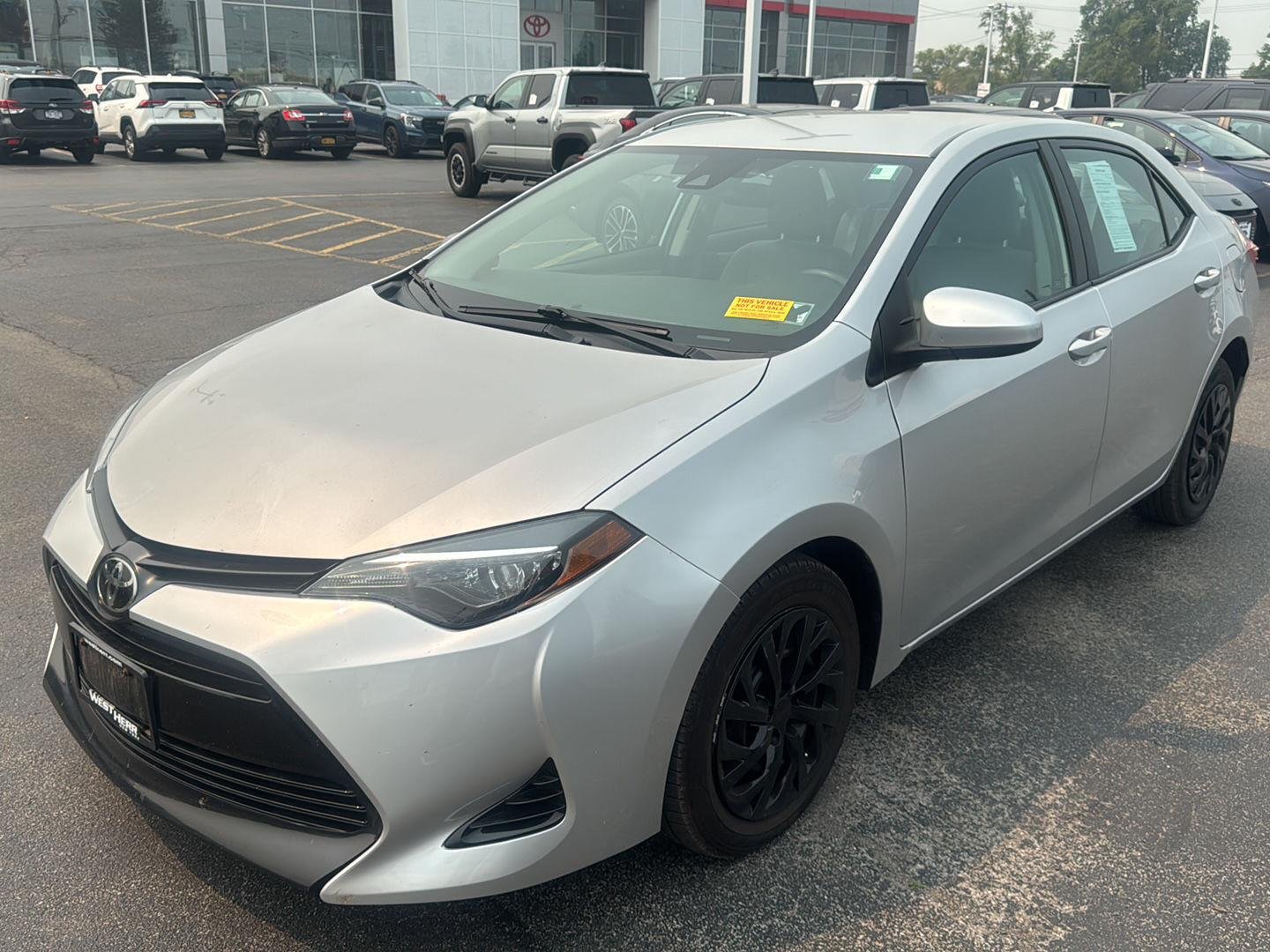 Used 2019 Classic Silver Metallic Toyota LE image 3