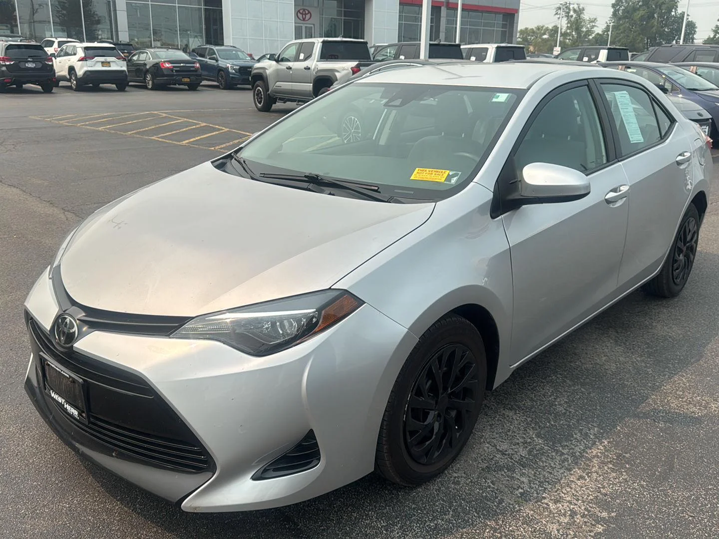Used 2019 Classic Silver Metallic Toyota LE image 3