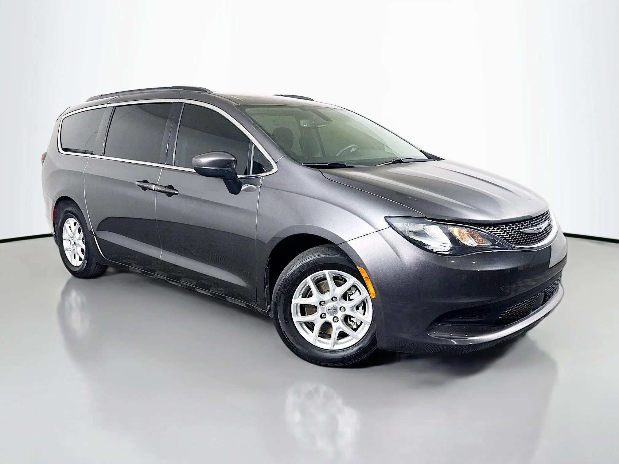 Used 2021 Granite Crystal Metallic Clearcoat Chrysler LXI image 1