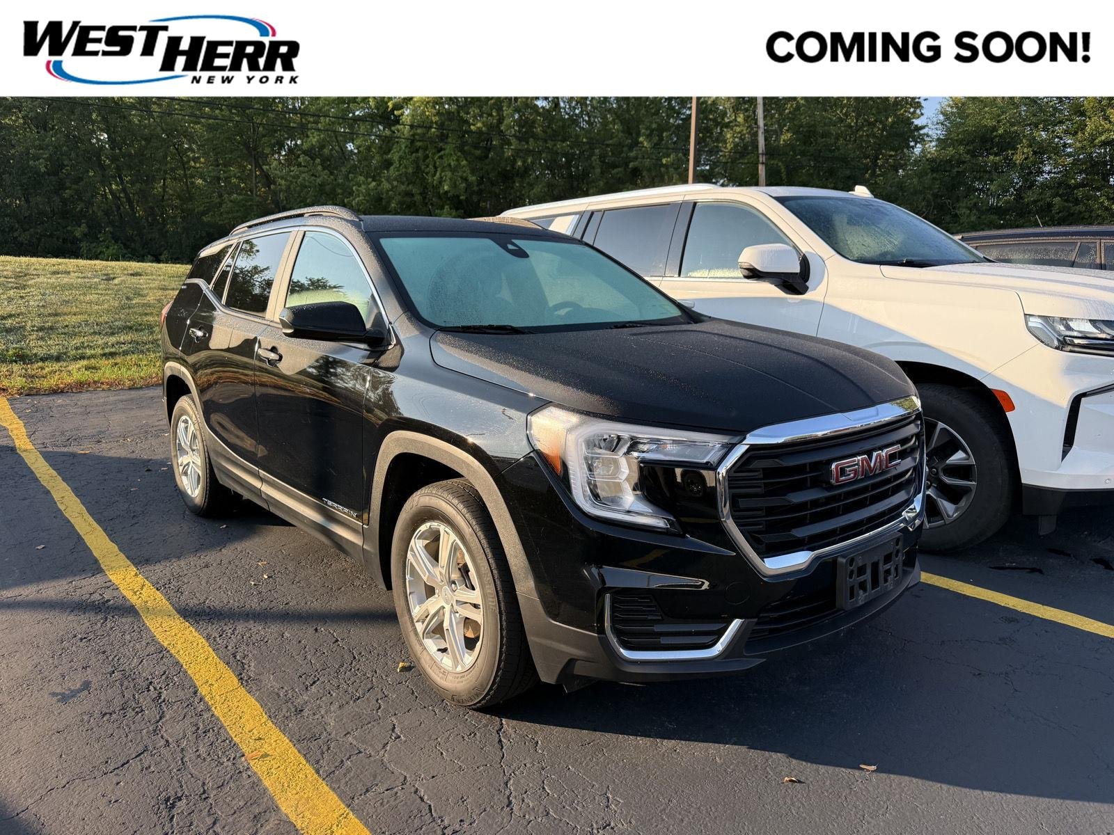 Used 2023 Ebony Twilight Metallic GMC SLE image 1