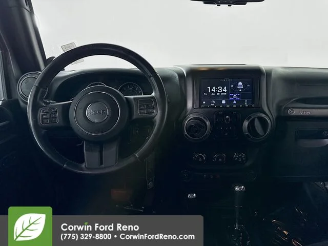 Used 2014 Billet Clearcoat Metallic Jeep Unlimited Sport image 19
