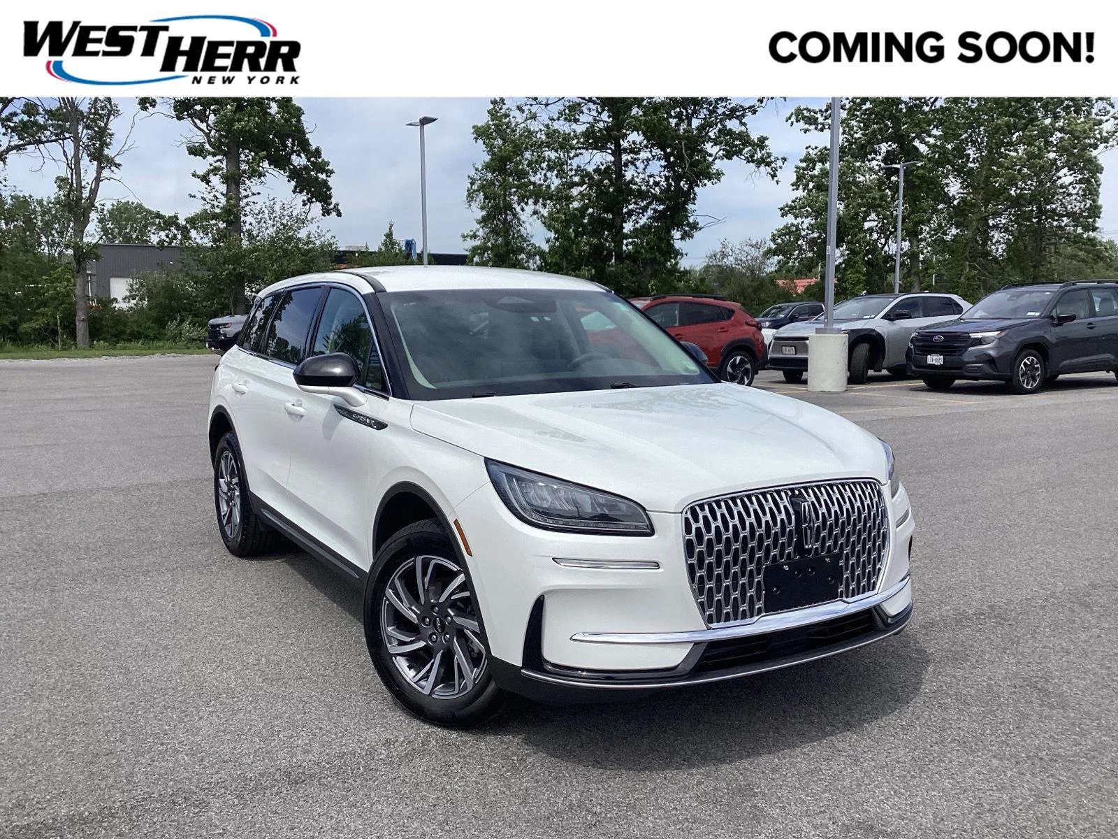 Used 2024 Pristine White Metallic Tri-Coat Lincoln Premiere image 1