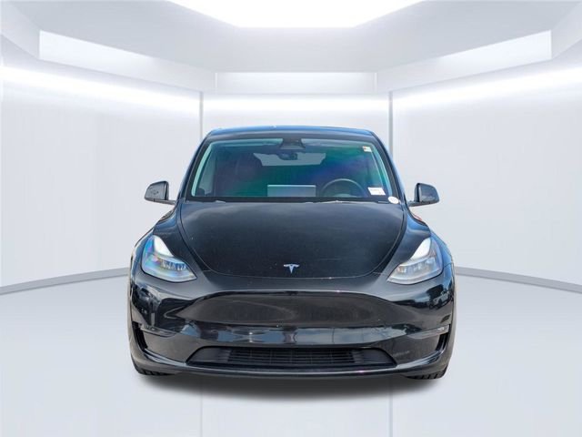 Used 2023 Solid Black Tesla Performance image 10