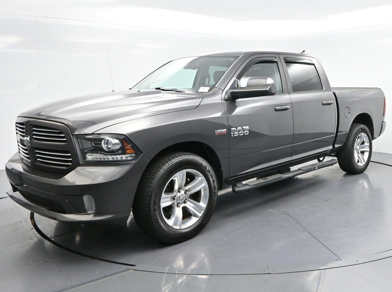 Used 2017 Granite Crystal Metallic Clearcoat Ram Sport image 3