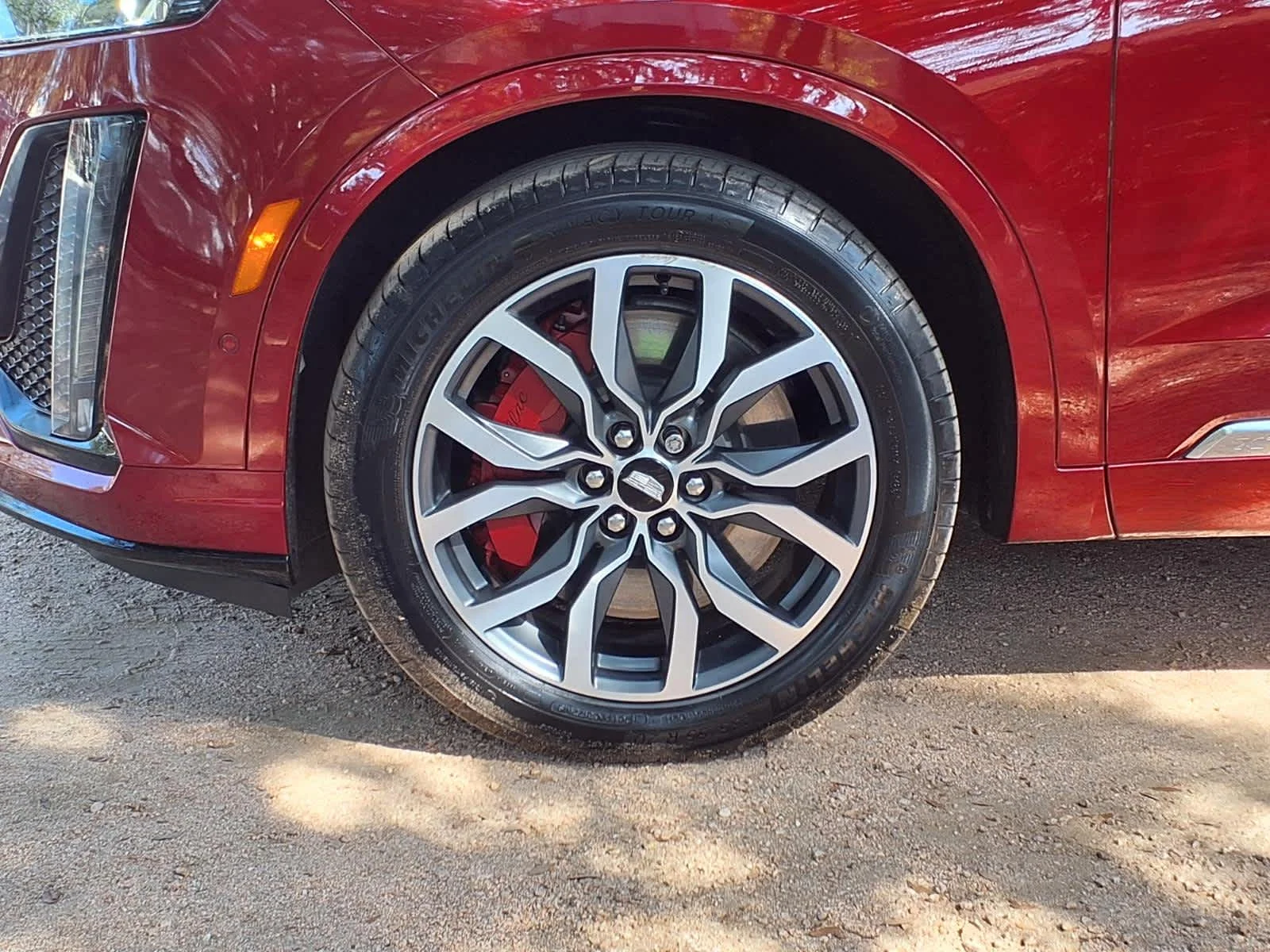 Used 2024 Radiant Red Tintcoat Cadillac Sport image 11