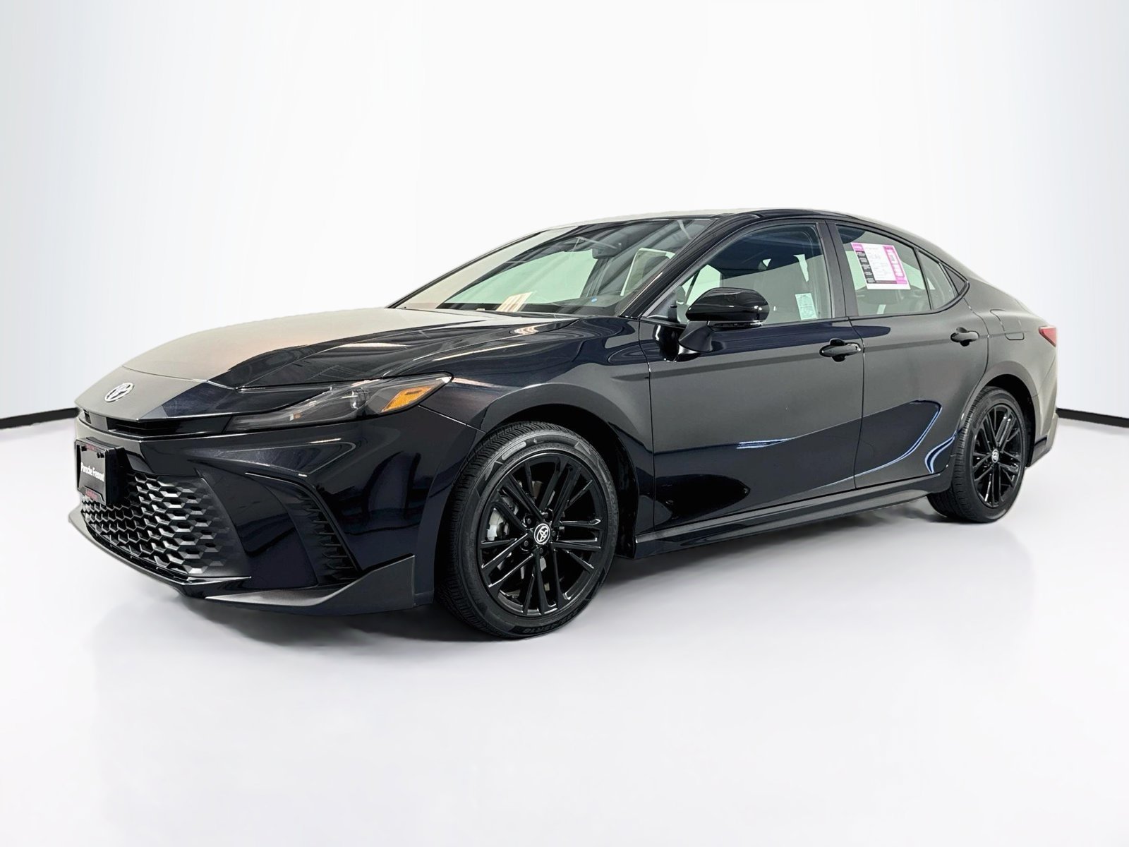 Used 2025 Midnight Black Metallic Toyota SE image 1