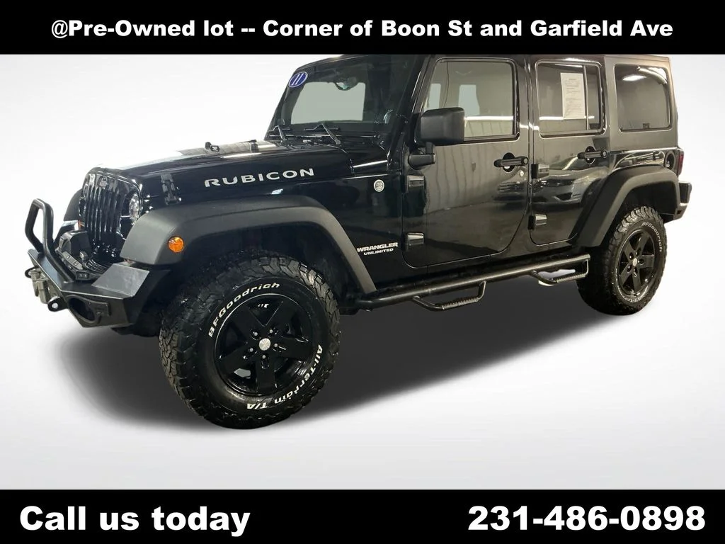 Used 2011 Black Jeep Unlimited Rubicon image 1