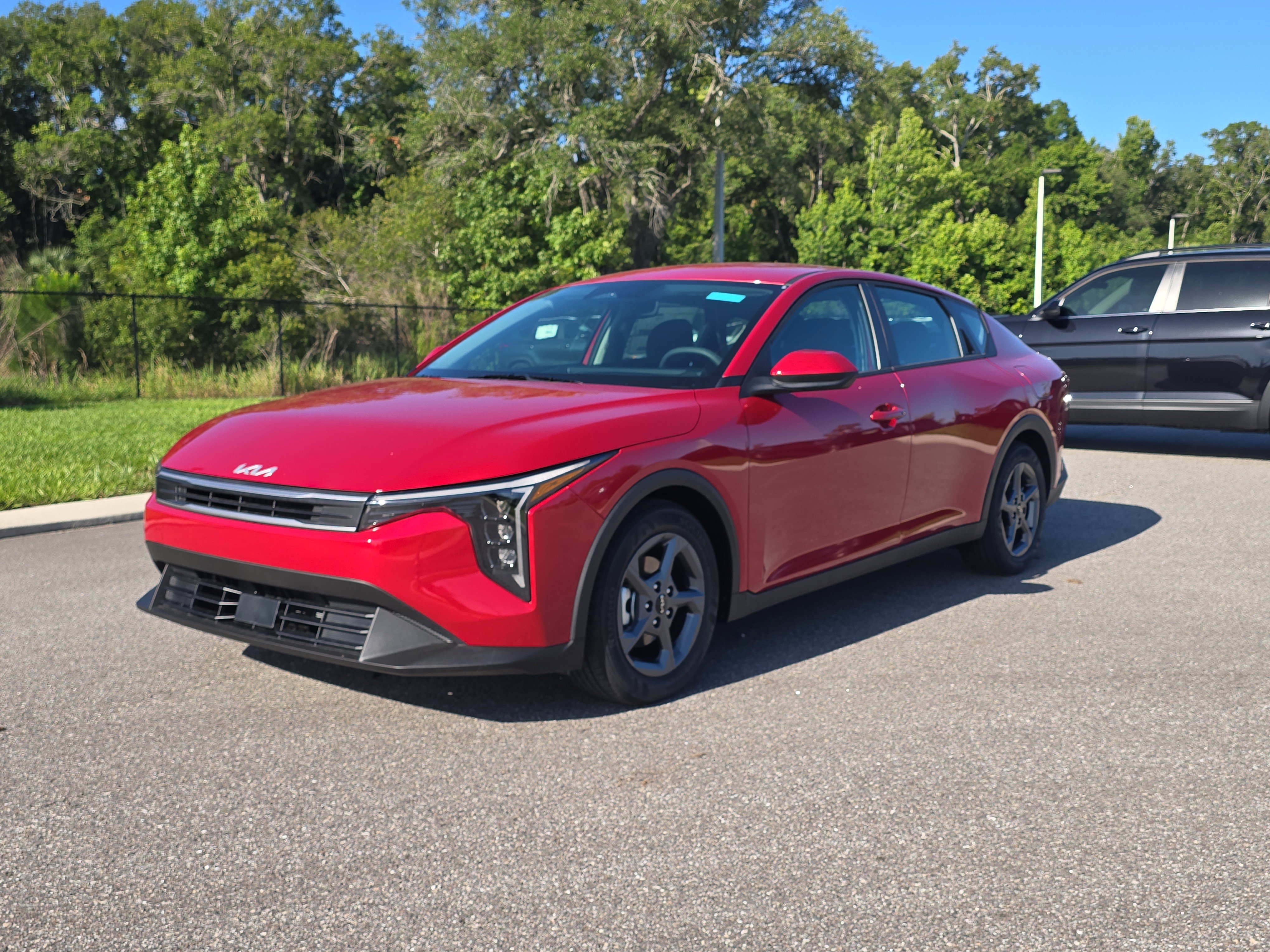 New 2026 Currant Red Kia LXS image 4