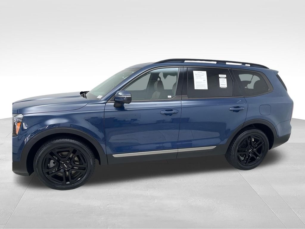 Used 2023 Black Kia EX X-Line image 2