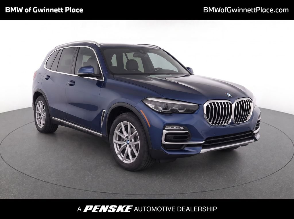 Used 2020 Phytonic Blue Metallic BMW xDrive40i image 1