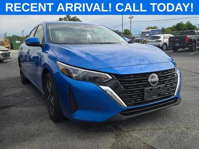 Used 2024 Electric Blue Met Nissan SV image 1