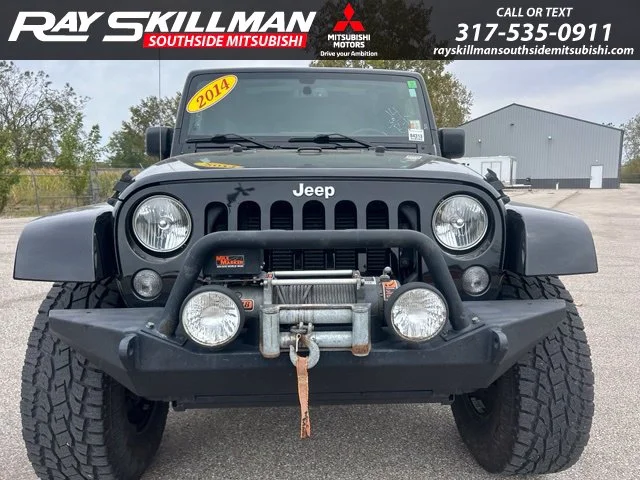 Used 2014 Black Jeep Unlimited Sahara image 2