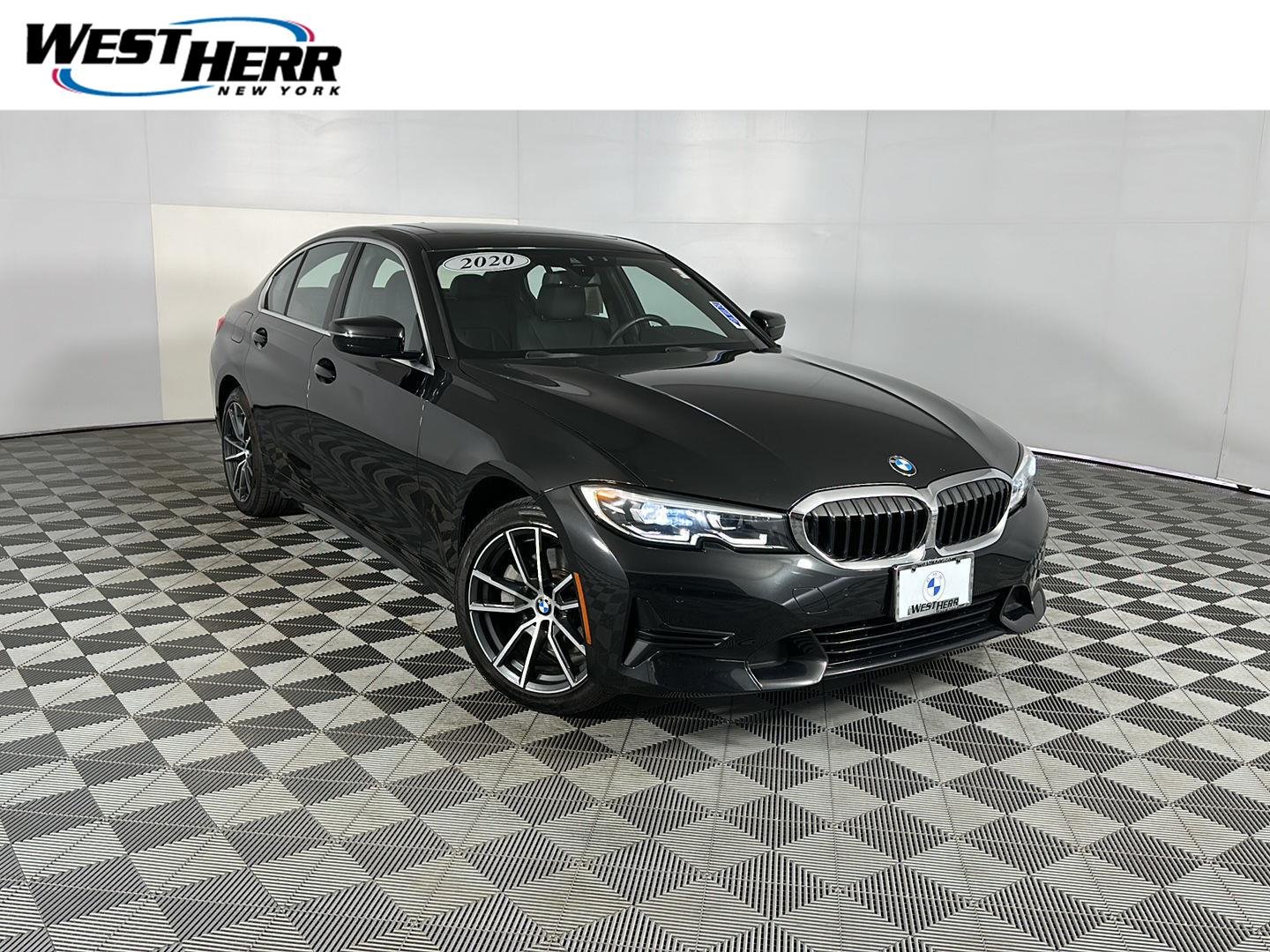 Used 2020 Black Sapphire Metallic BMW 330i xDrive image 1