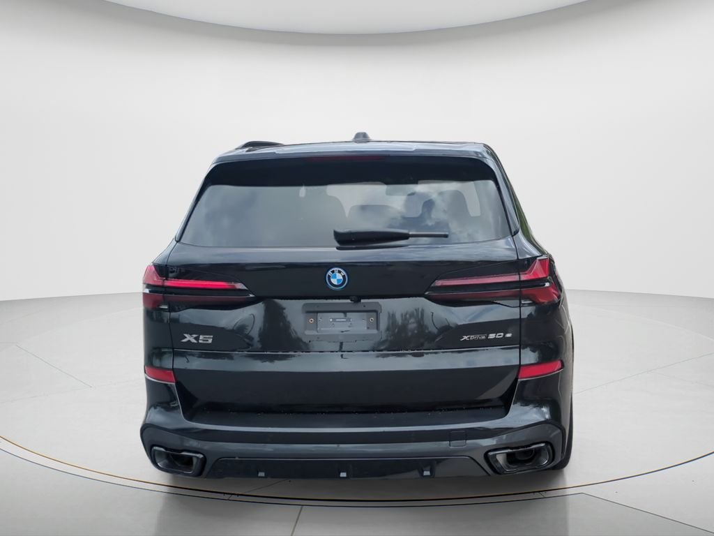 New 2026 Black Sapphire Metallic BMW xDrive50e image 4