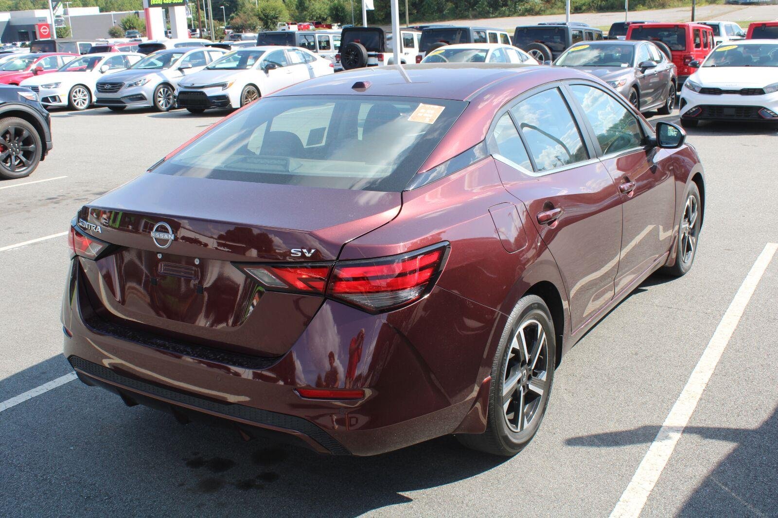 Used 2024 Rosewood Metallic Nissan SV image 6
