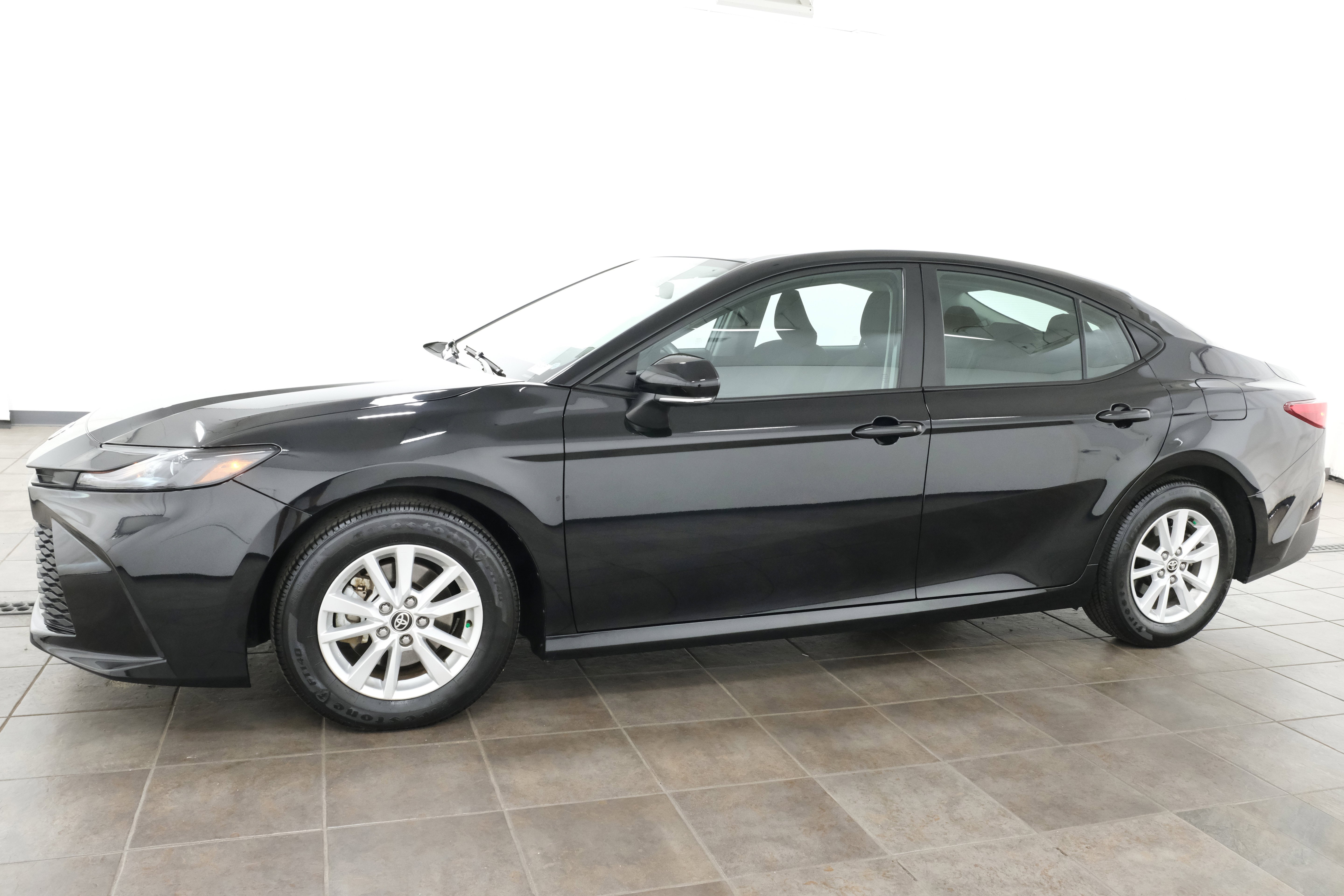 Certified Used 2025 Midnight Black Metallic Toyota LE image 3