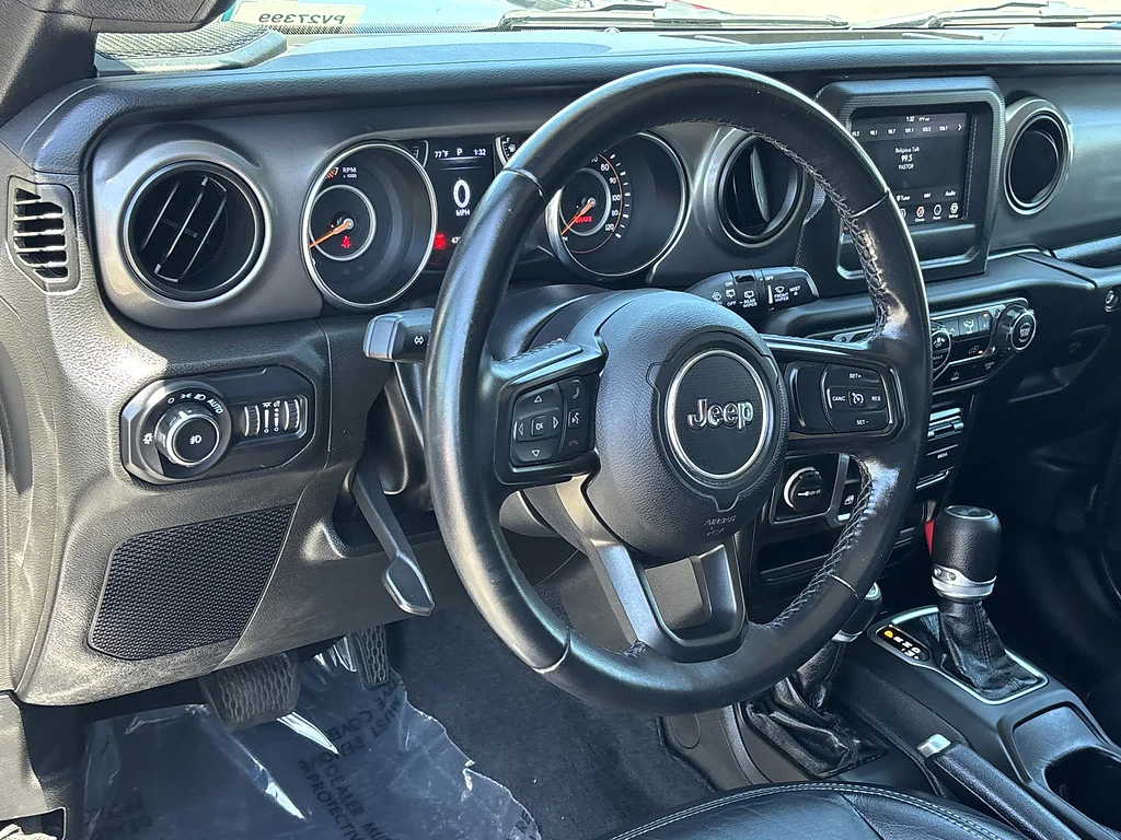 Used 2022 Granite Crystal Metallic Clear Coat Jeep Sport S image 10