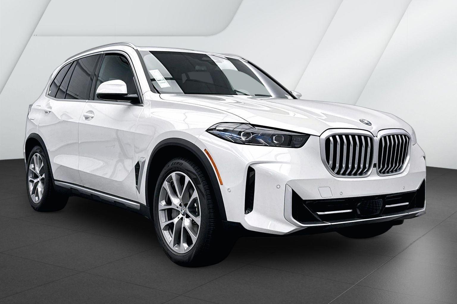 New 2026 Mineral White Metallic BMW xDrive50e image 1
