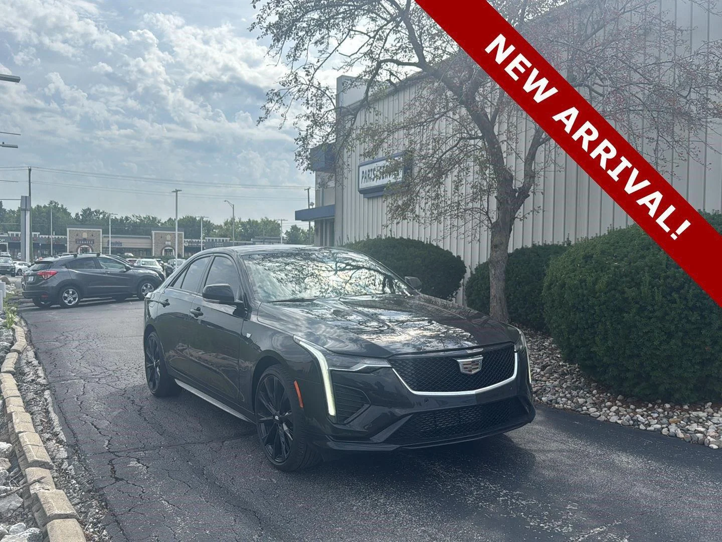 Used 2023 Black Raven Cadillac Sport image 1