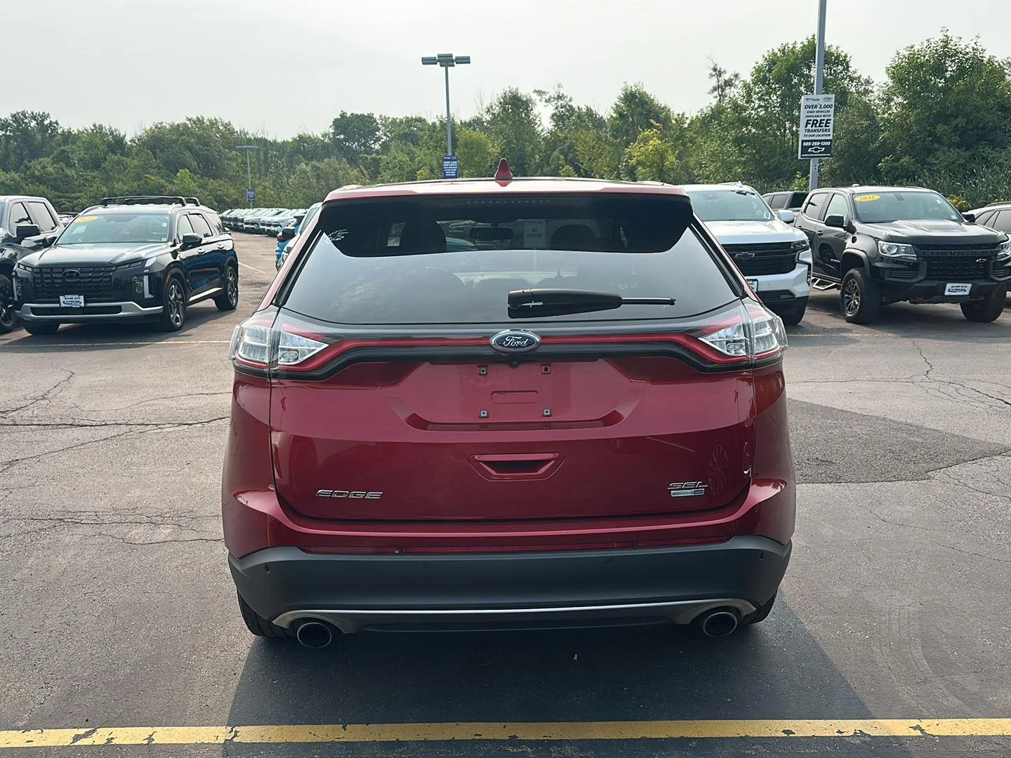 Used 2018 Ruby Red Metallic Tinted Clearcoat Ford SEL image 3