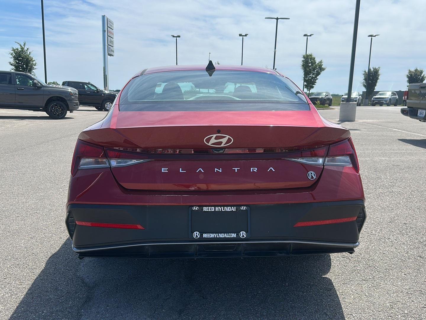 Used 2025 Ultimate Red Hyundai SE image 3