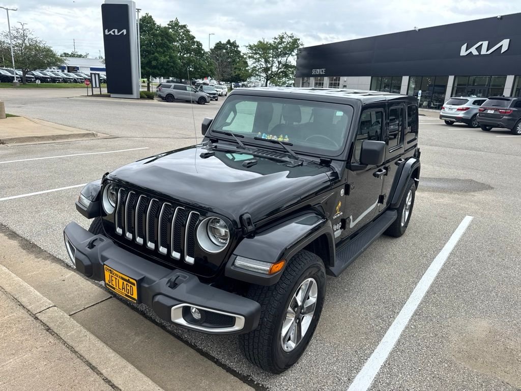 Used 2022 Black Jeep Unlimited Sahara image 2