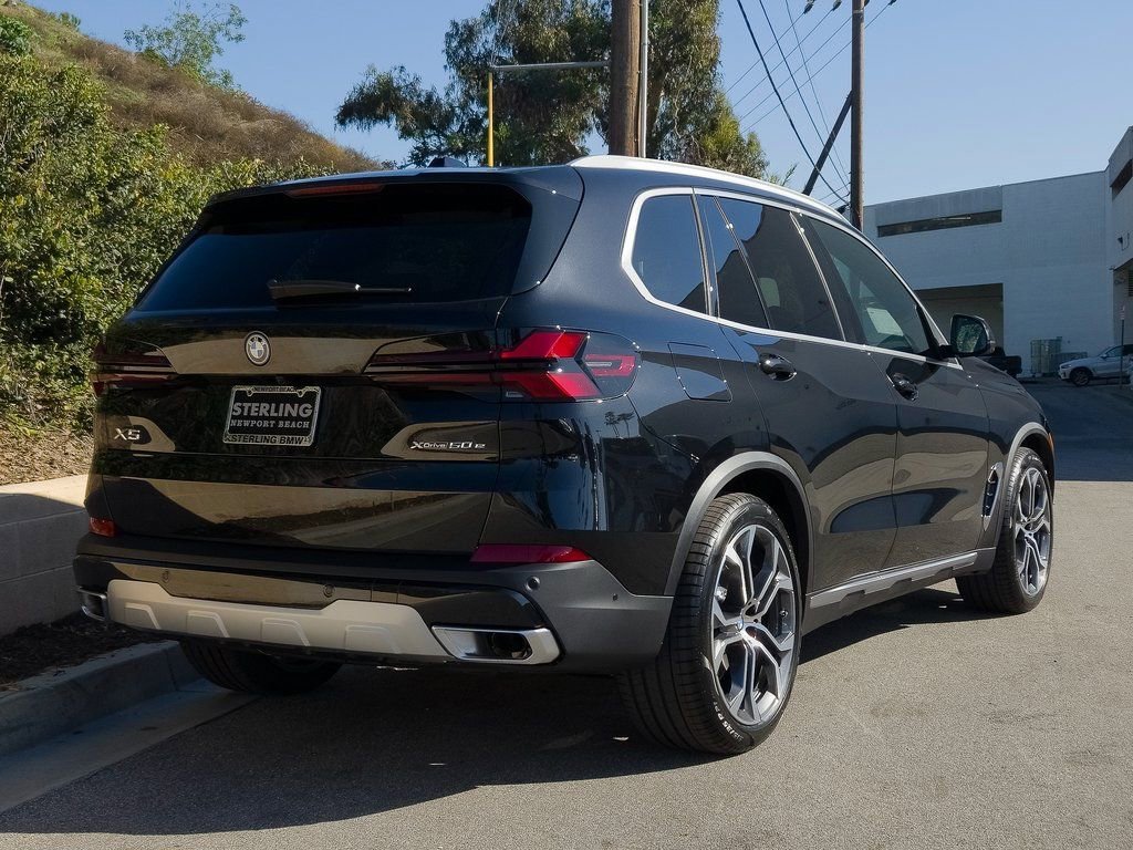 New 2026 Black Sapphire Metallic BMW xDrive50e image 5