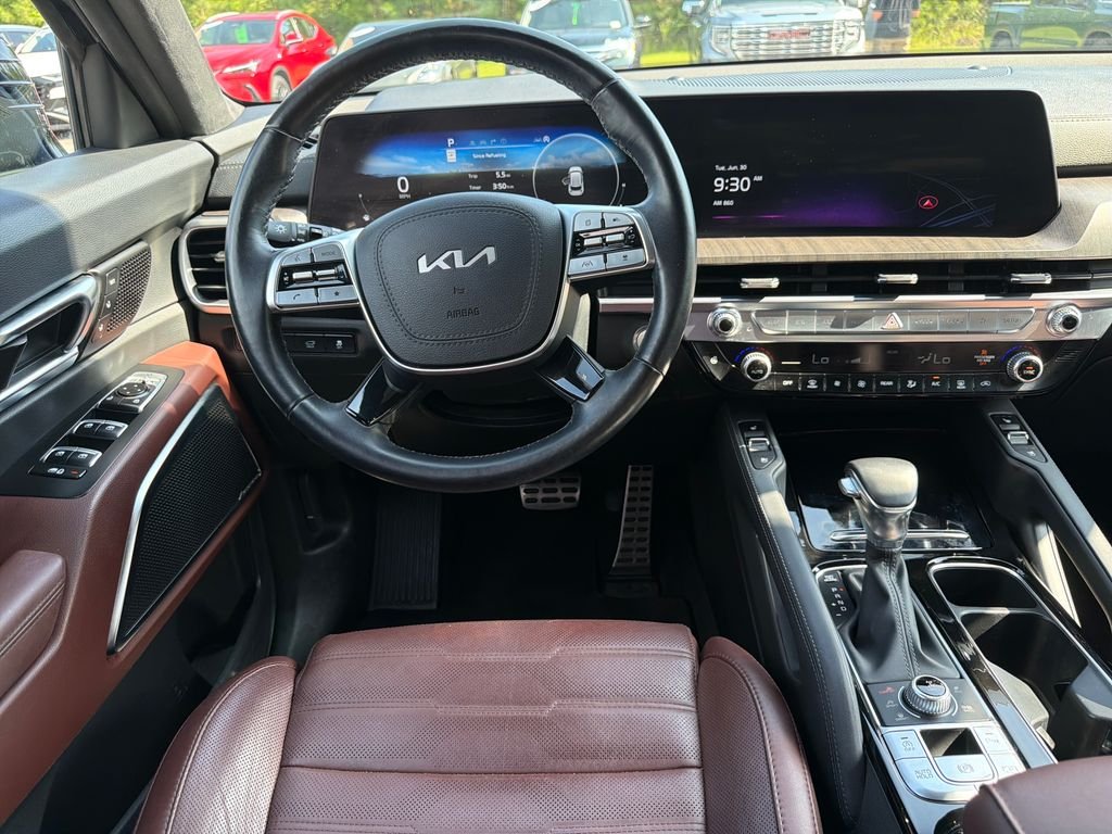 Used 2023 Ebony Black Kia SX-Prestige image 3