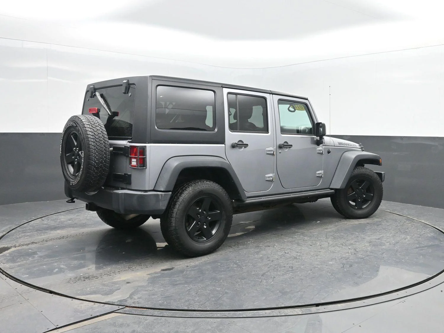 Used 2016 Jeep Wrangler Unlimited Black Bear with VIN 1C4BJWDG4GL167700 for sale in Charles City, IA