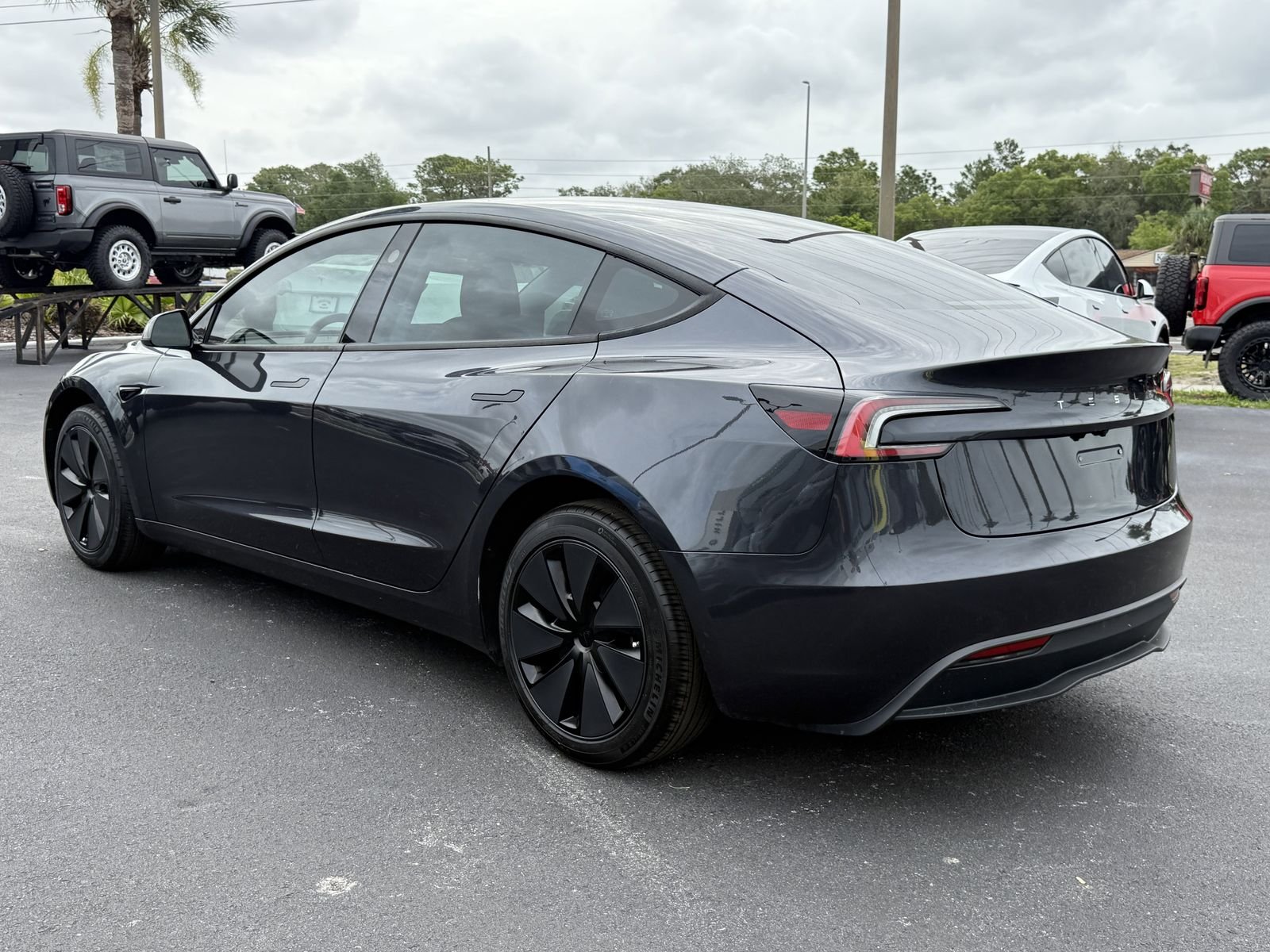 Used 2025 Stealth Gray Tesla Long Range image 6