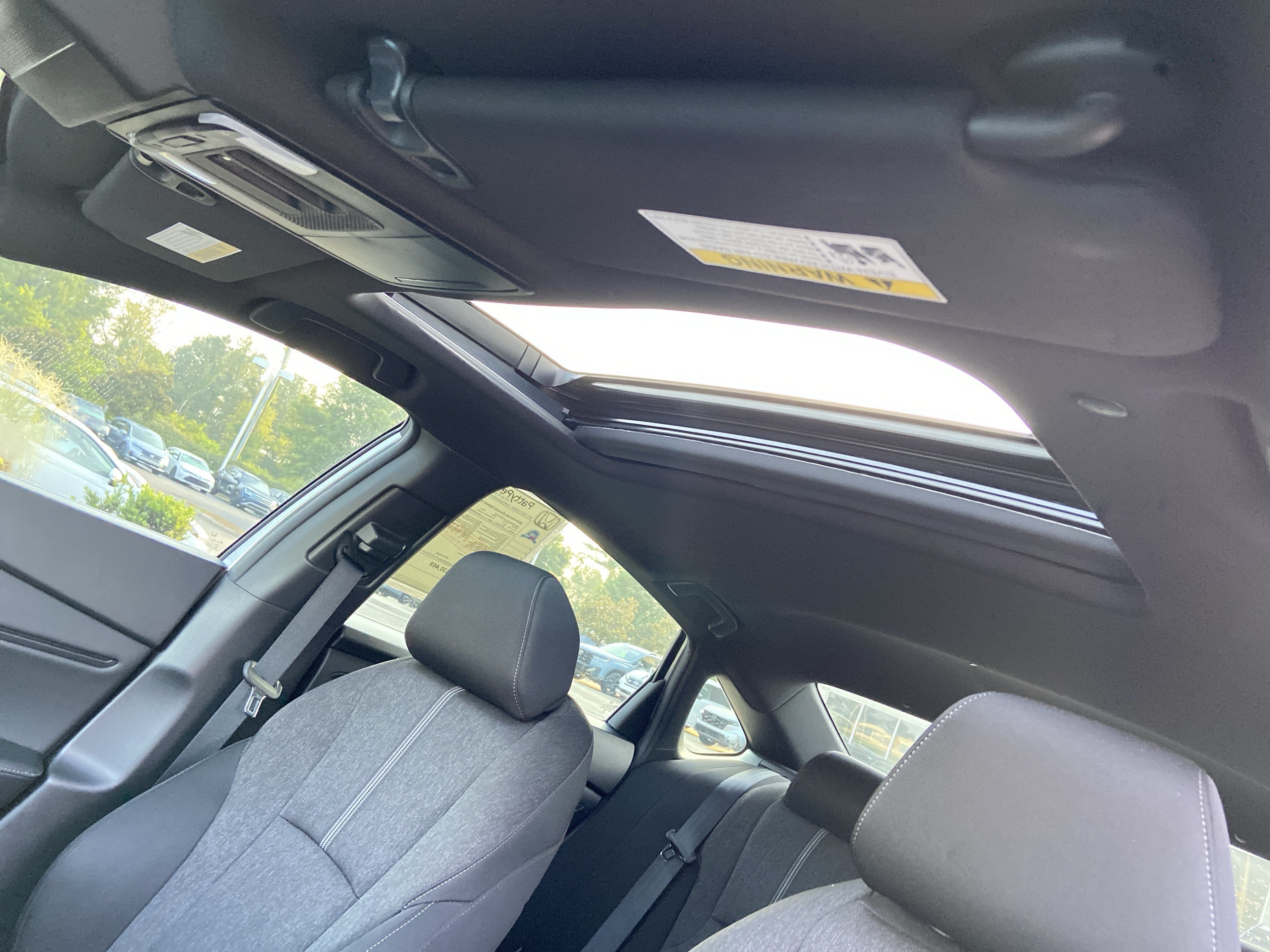 Used 2024 Solar Silver Metallic Honda Sport image 29