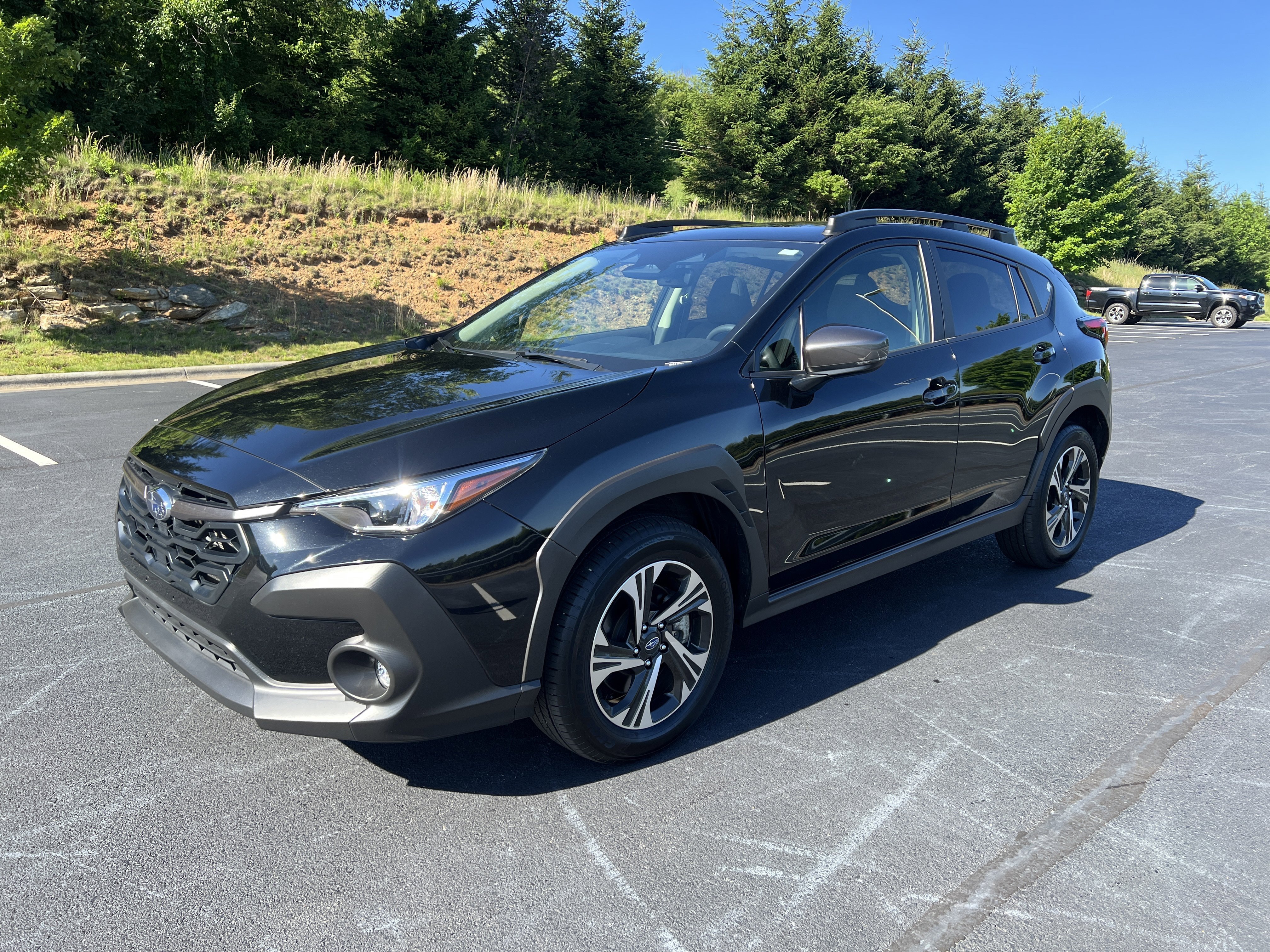 Used 2024 Crystal Black Silica Subaru Premium image 1
