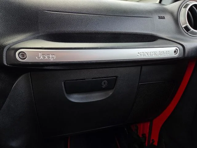 Used 2015 Red Jeep Unlimited Sahara image 32